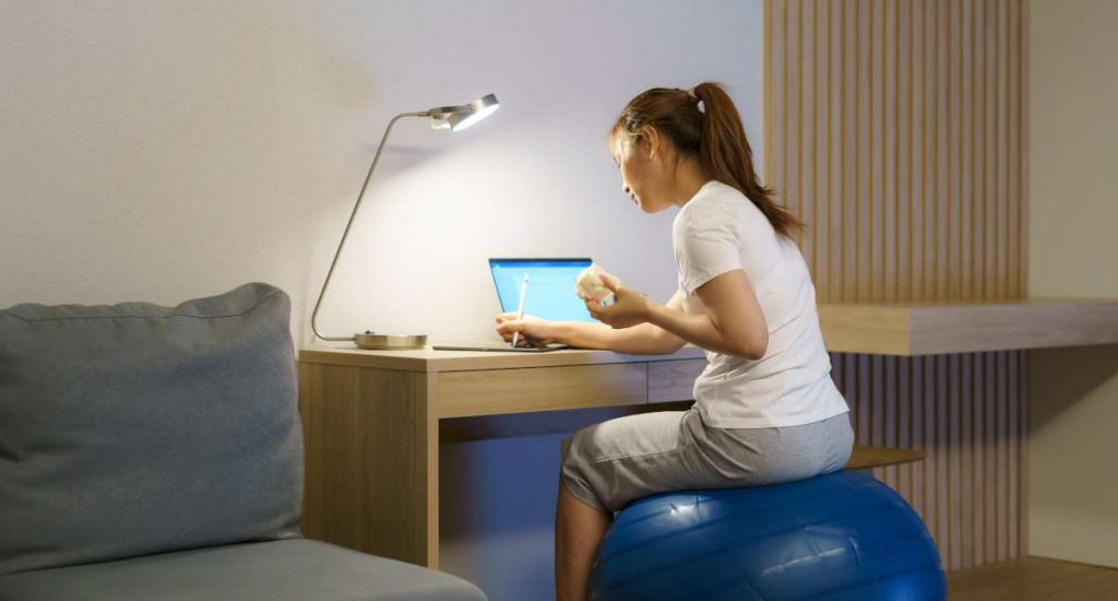 woman-yoga-ball-with-laptop-while-work-from-home
